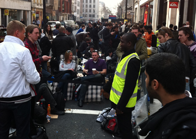 Shoppers get comfy outside Apple's Regent Street store earlier today (Pic from Firebox.com)