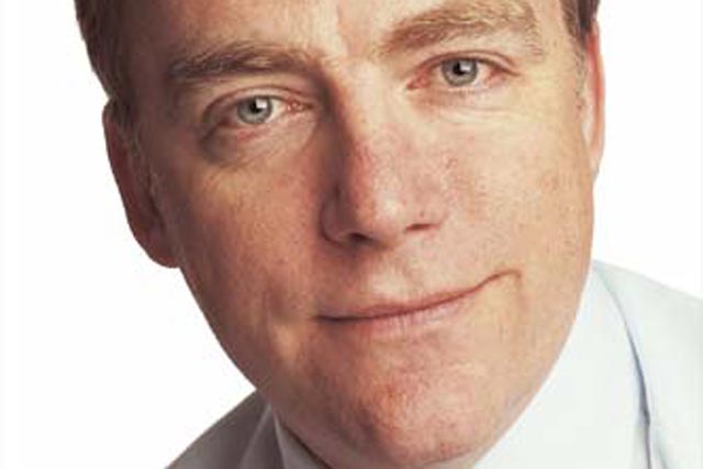 Andrew Higginson: Tesco's chief executive of retailing services to retire next year