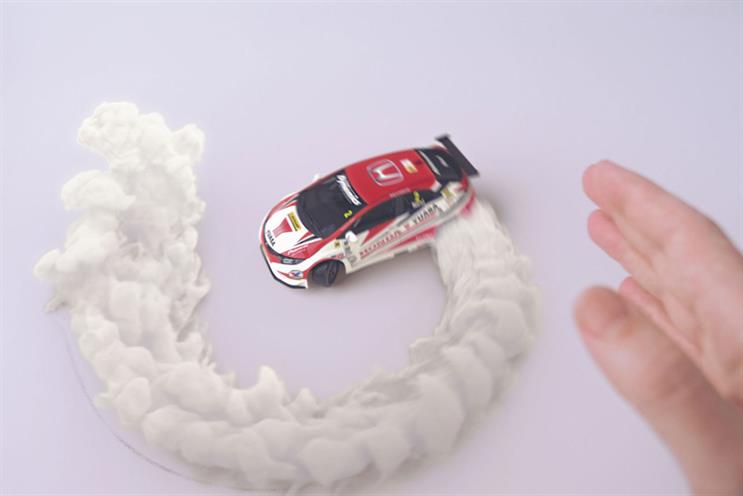 Honda: shot from the perspective of an engineer, the 3D CG models in the film were made as lifelike as possible, with – for the car – full suspension and exhaust smoke effects, as well as detailed interior and opening doors