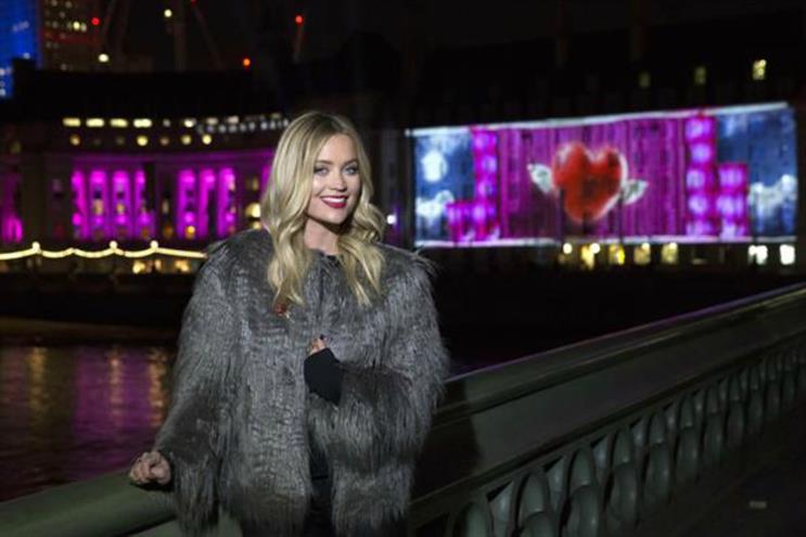 Very stages 60-foot wide Christmas ad projection in London