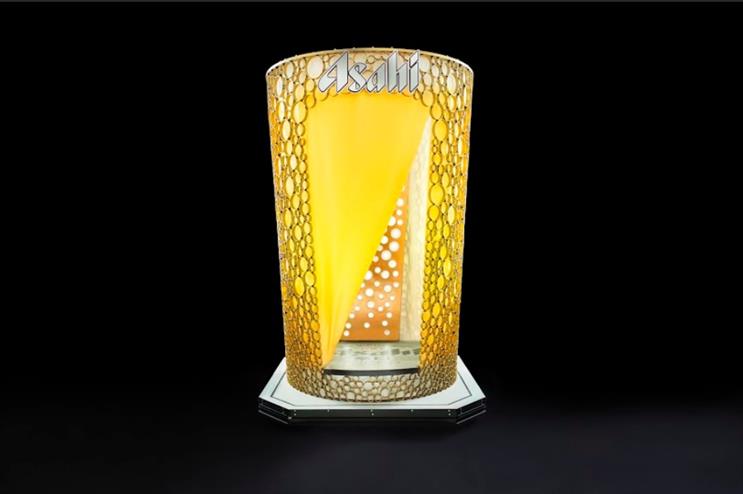 The booth has been designed to look like a pint of the lager