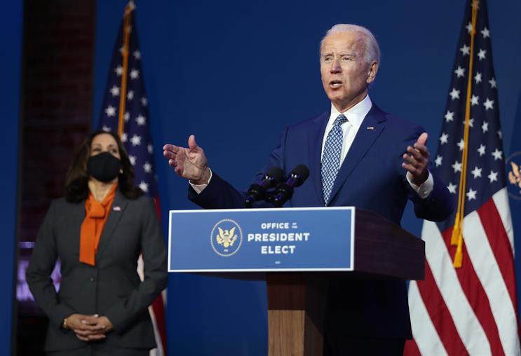 Biden: flanked by vice-president-elect Kamala Harris (Joe Raedle/Getty Images)