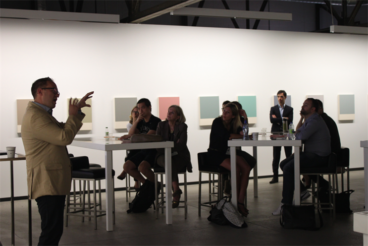 Robert Masse talks to workshop participants at the C2 conference