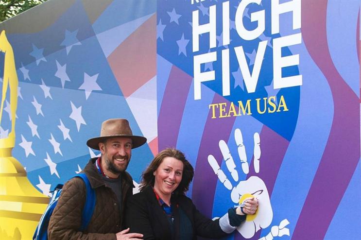 Guests high five Team USA with RFID tech