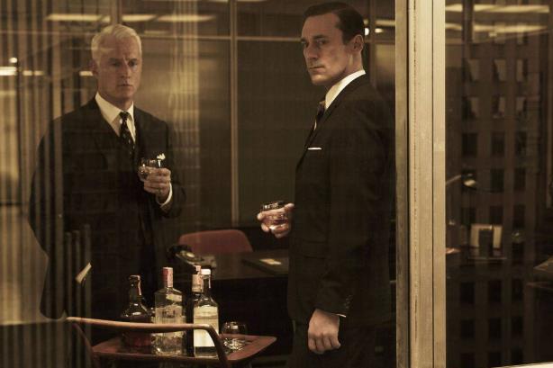 Mad Men: TV drama's Roger Sterling and Don Draper were rarely without a drink in their hands (Picture: AMC/Facebook)
