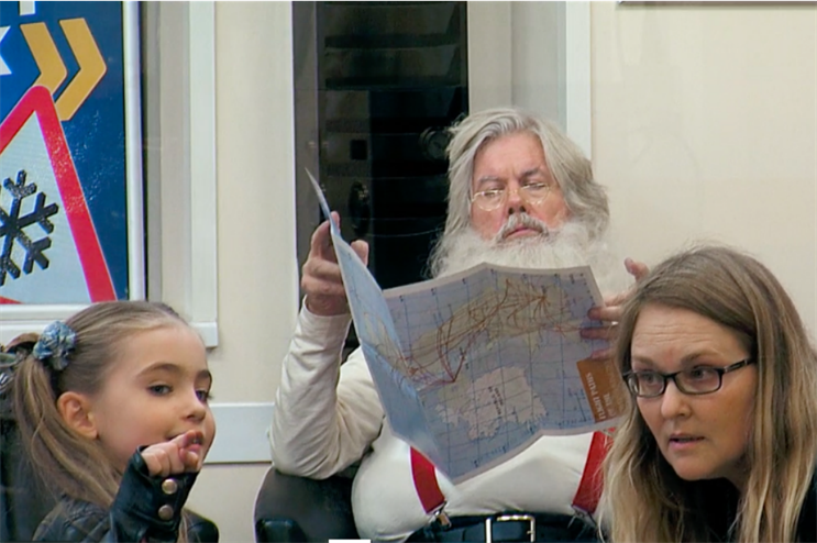 Santa was spotted waiting for his sleigh to be serviced