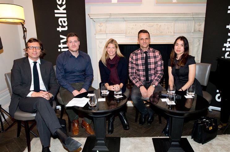 The panel of luxury brand experts at the event moderated by Siegel+Gale President Philip Davies (far left)