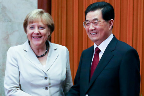 Closer ties: German chancellor Merkel with China premier Jiabao (Credit: Getty Images)