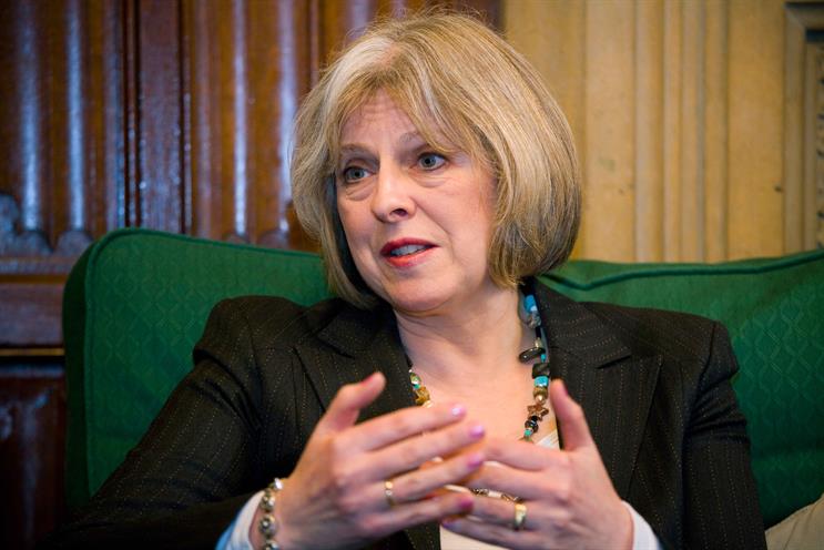 Theresa May: to push ahead with police service reform