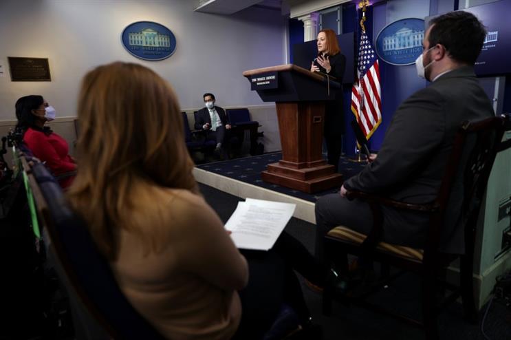 Deputy press secretary TJ Ducklo looks on as Jen Psaki delivers the daily White House press briefing on Thursday. (Pic: Getty Images.)
