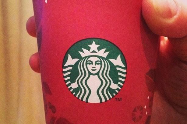 Starbucks has come under criticism this year for not adding seasonal decorations to its red cups. Previous designs, like the one above, were adorned with symbols of Christmas and winter.
