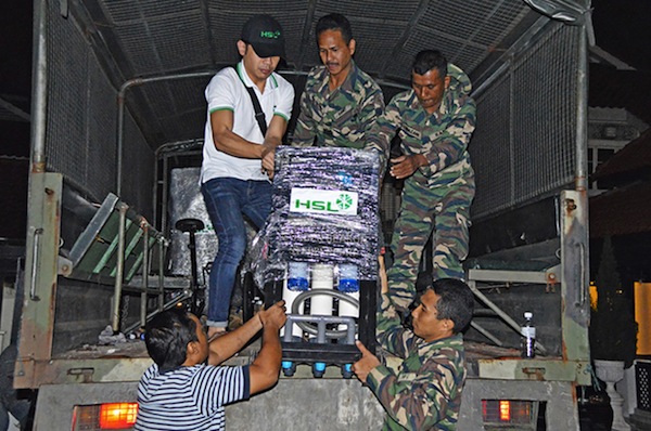 The CCF providing aid during the Kelantan floods (CCF)