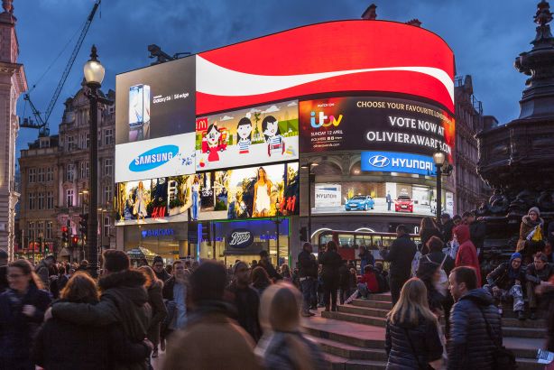 Clear Channel: Billboards on display in London's Piccadilly Circus