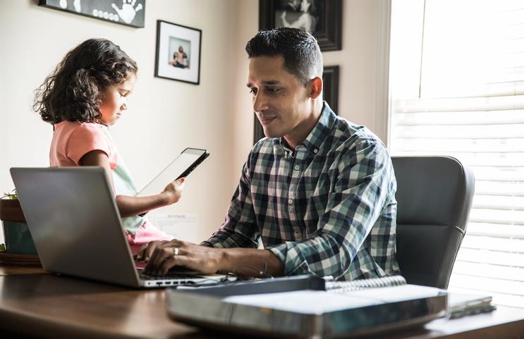 Hispanic families are banking online more than their white counterparts. (Photo credit: Getty Images). 