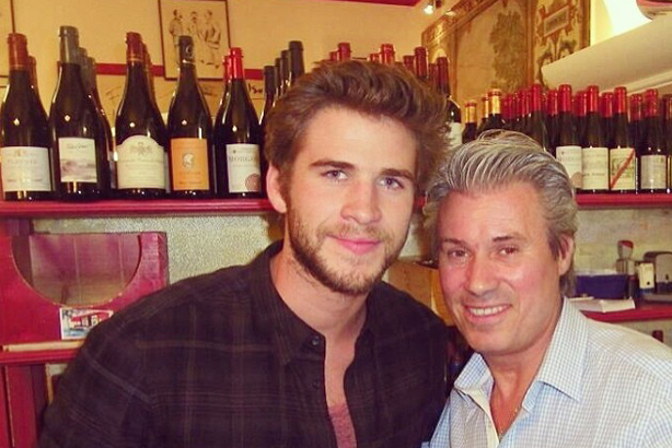 Les Gourmets des Ternes: Owner of the Paris branch Jean-Francois Marie (right) with actor Liam Hemsworth
