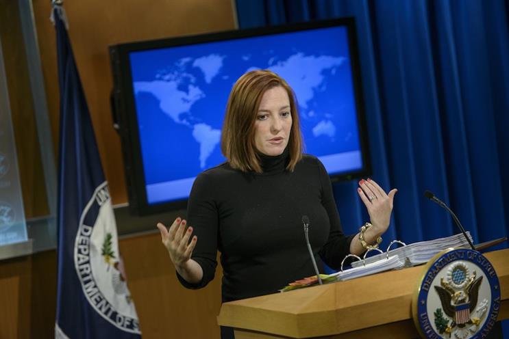 Jen Psaki briefs the press for the Obama White House in 2015. (Photo credit: Getty Images). 