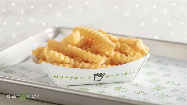 Bummed about a flight cancellation? Shake Shack is hoping a free serving of french fries will help. (Photo credit: Shake Shack). 