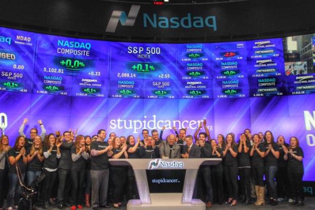 Members of Stupid Cancer ring the bell to open the Nasdaq exchange last Novembe. (Image via Stupid Cancer's Facebook page). 