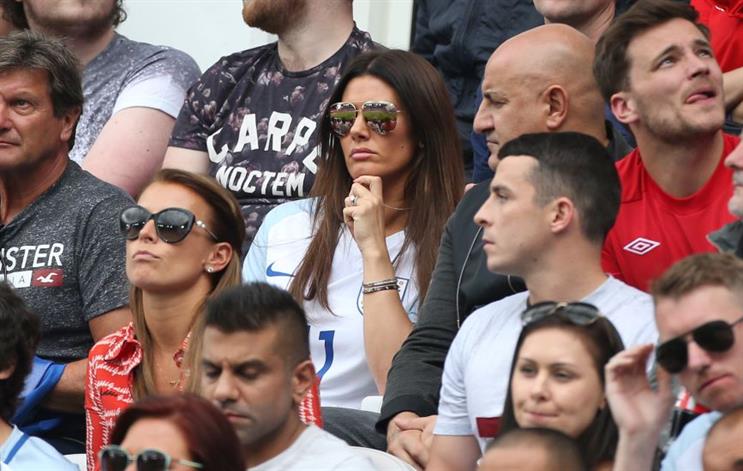 Coleen Rooney (l) and Rebekah Vardy watch their husbands playing for England in 2016. Photo credit: Getty images