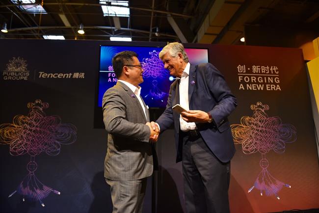 Agreement: SY Lau and Maurice Lévy.