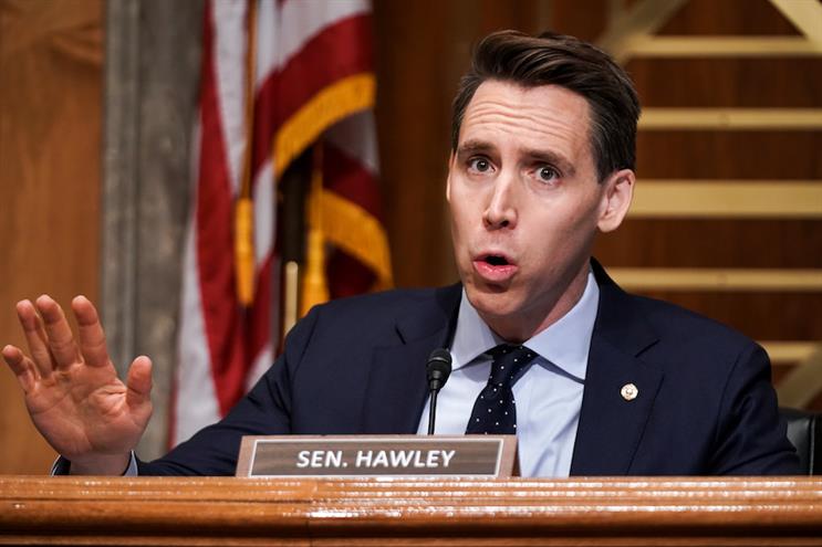 Sen. Josh Hawley (R-MO) was mocked as a 'sore loser' in a tweet erroneously posted by Walmart's account. (Photo credit: Getty Images)