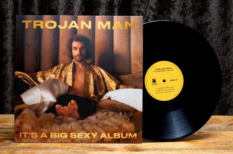 Trojan Man sings, 'I touched a penis today,' on Big Sexy Album