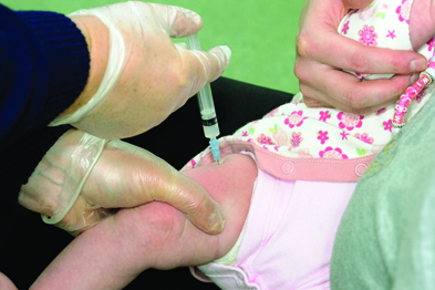Pertussis immunisation: high coverage with 5-in-1 vaccines has been attained (Photograph: SPL)