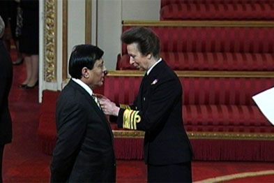 Dr Chand receiving his OBE