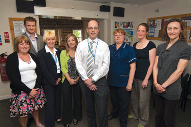 Dr Steve Thomas (fifth from left): 'This approach has resulted in a 20% reduction in unscheduled admissions in over 75s.'