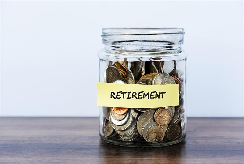 Jar of coins labelled 'retirement'