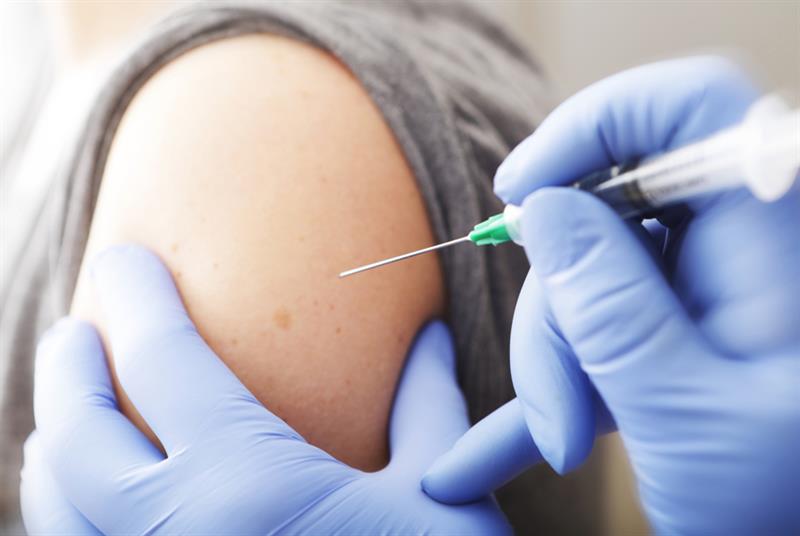 Vaccine being injected into arm