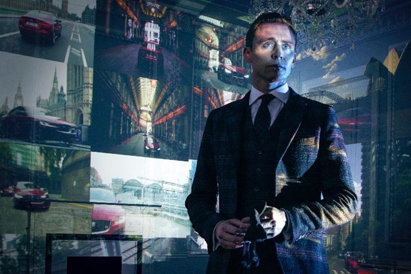 Jaguar Mastermind Tom Hiddleston Unleashes Xe While Feeding Ben Kingsley To Big Cat