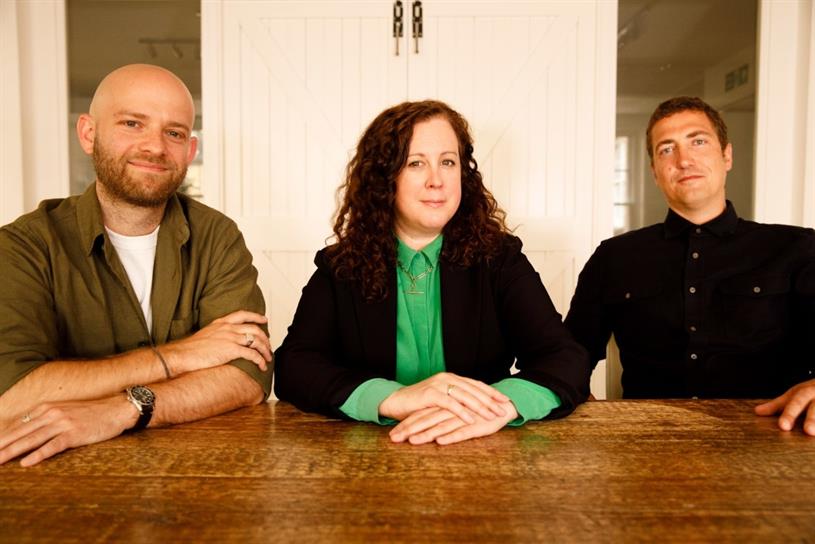 A picture of The Brooklyn Brothers' Will Sansom, Abi Findlay and Orlando Warner sitting at a table. Photo: Aisha Seriki