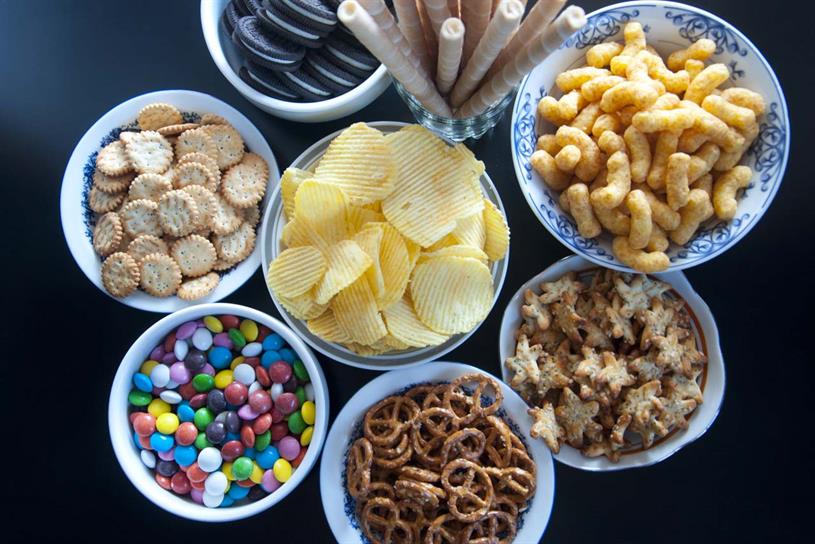 UK says limit kids to 2 sugary snacks UK says limit kids to 2 sugary snacks