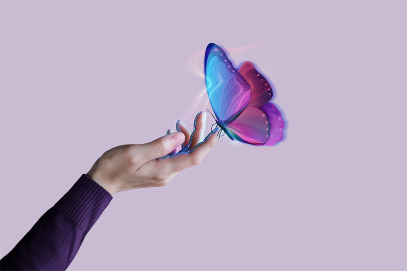 A human hand touches a web3 butterfly (Getty Images) 