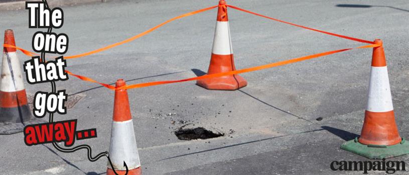 Image of a pothole in a road