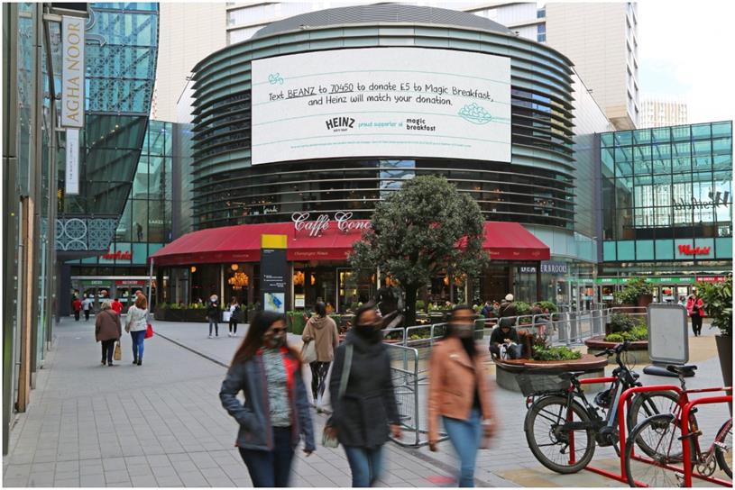 Mock up of Heinz and Magic billboard outside on Four Dials Westfield Stratford City London.