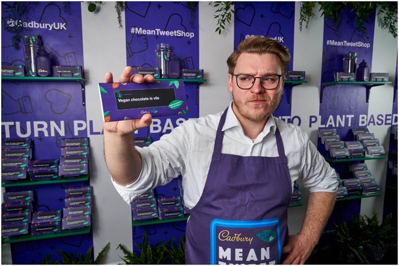 Man holding a limited edition Cadbury plant bar