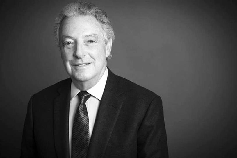 A black and white photo of Michael Roth, who retires as executive chairman of Interpublic at the end of 2021