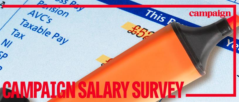 Highlighter pen concealing part of pay slip with salary information