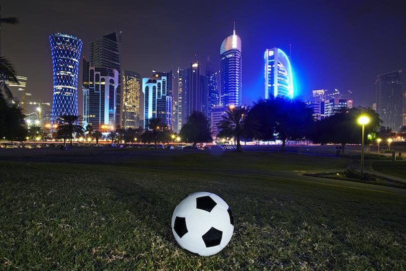 World Cup Football and skyline of the West Bay Doha, Qatar.
