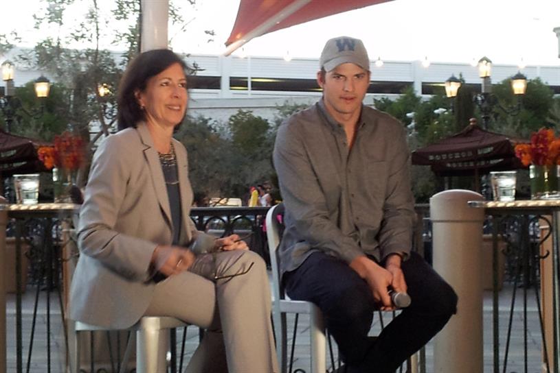 Ashton Kutcher (right) with with OMD CEO Monica Karo. 
