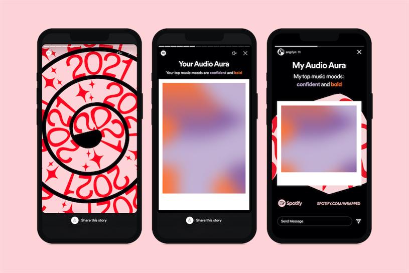 Three iPhones displaying Spotify's 2021 wrapped app.