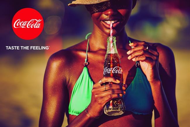 Coca-Cola: new tagline "Taste the Feeling" replaces "Open Happiness."