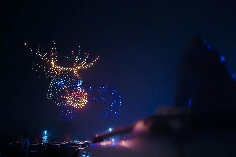Walmart Holiday Drone Light Show creating reindeer head.