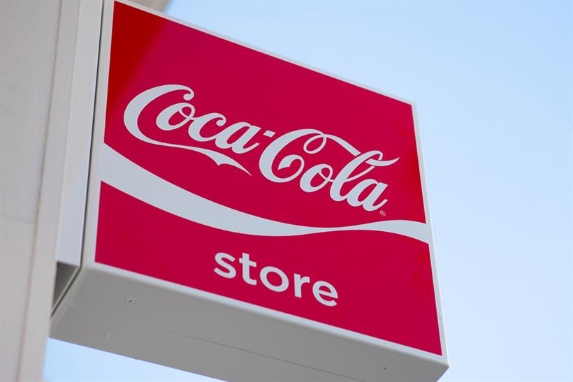 A picture of the Coke Store sign