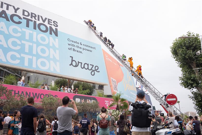 Greenpeace protesters mount Palais in Cannes