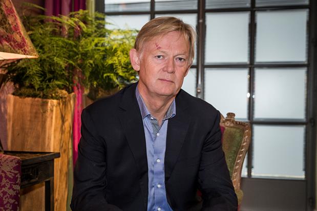 The Advertising Association's Stephen Woodford stares unsmilingly into the camera, while a potted fern spills into the background