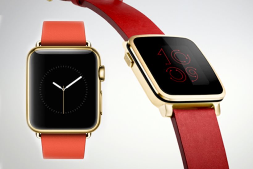 At Mobile World Conference, Pebble Time Steel (right) tried to steal Apple Watch's thunder.