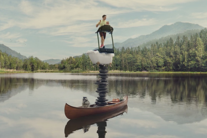 Blue Bunny ice cream ad showing man on treadmill in a boat on a lake
